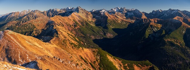 Czerwone Wierchy in Tatry Mountains during autumn, Carpathia. Colorfull nature landscape panorama with blue cloudless sky. © Marcin Mucharski