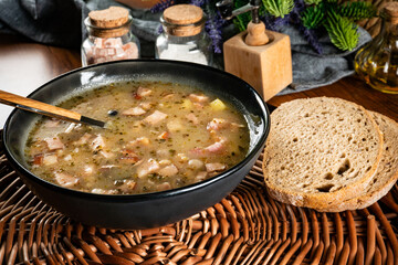 Sour soup in bowl.