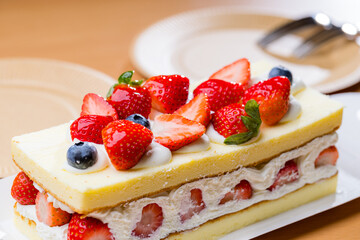 Fresh strawberry cake on the table