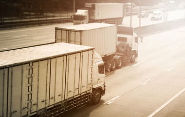 Trucks Driving on Highway Road. Cargo Container Shipping, Economical Transportation Business....