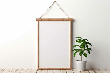 Interior poster mockup with vertical wooden frame on empty white wall decorated with plant branch and hanging macrame pot