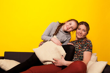 Mom and daughter hugging family together love