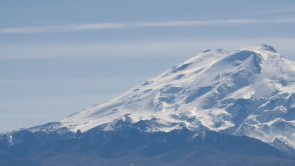 Fototapeta na wymiar Alps cold mountain top, scenic winter landscape. Creative. Snow covered giant mountain peak.