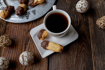 Shortbread cookies with a cup of coffee on christmas table background