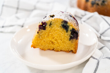 Lemon blueberry bundt cake with powdered sugar dusting