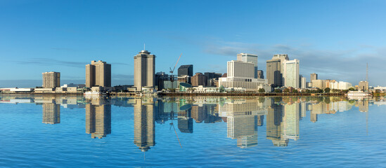 scenic view to New Orleans skyline in morning light from river Mississippi, USA
