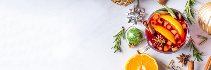 Traditional Christmas aromatic mulled wine cocktail, red wine grog tea drink with spices, cinnamon,...