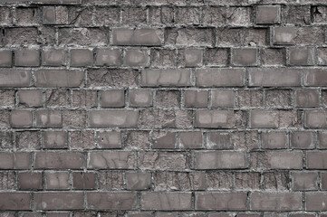 old brick wall close up in gray color