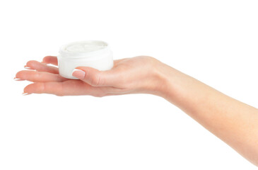 Female hand holding cosmetic cream jar isolated on white background 