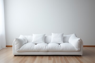 Fototapeta na wymiar A soft and large white sofa on a white background.