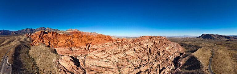 Panoramic view over Red Rock Canyon in the Nevada Desert aerial drone photography - obrazy, fototapety, plakaty