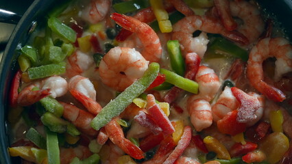 Cooking Vegetables and Shrimps in Pan, Macro Shot boiling food
