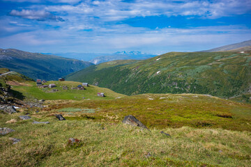 Fototapeta na wymiar Seter mountain farm landscape along Aurlandsfjellet scenic route near Kvignadal, Norway.