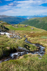 Seter mountain farm landscape along Aurlandsfjellet scenic route near Kvignadal, Norway.