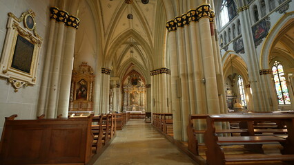 Fototapeta na wymiar Fribourg, Switzerland Circa March 2022 - Interior of Traditional Catholic Cathedral - Saint Nicholas Worship Architecture