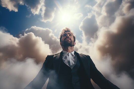 A man in a suit standing in the clouds. This image can be used to depict success, aspirations, and reaching new heights
