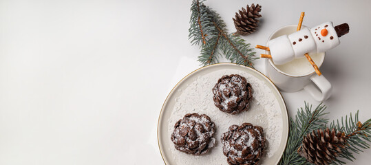 Christmas tree coneshaped cookies with chocolate flakes with powdered sugar, a delightful homemade...