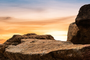 Rock stone on sunset sky background, Rock podium outdoor with orange sunlight sky well space for...