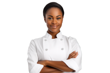 Happy African American woman standing with arms crossed while working as chef in a restaurant and looking at camera