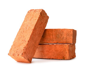 Cracked old red or orange bricks in stack isolated on white background with clipping path