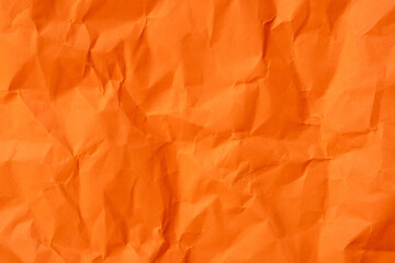 Orange crumpled paper texture used for paper background texture in decorative art work