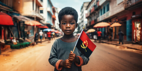 Angolese boy holding Angola flag