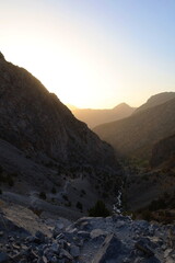 Mountain landscape on a hiking trail from Artuch tu Kulikalon lakes in Fann Mountains, Tajikistan