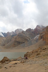 Mutnyi lake with Chimtarga pass in the background located under the highest peak of Fann mountains - Chimtarga, Tajikistan
