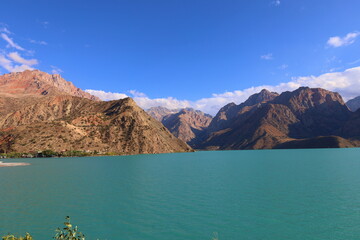 Turquoise mountain lake Iskandarkul located in Fann mountains, Sughd, Tajikistan