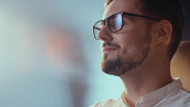 Slo mo shot of man business analytic browsing financial reports. Focused content researcher guy in office. Outsource freelancer professionally doing his job. Male employee wear glasses doing report on