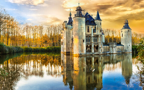 Belgium Kasteel de Borrekens Vorselaar 8K panorama. Medieval castle reflection. Fairytale fortress in Antwerp. European heritage architecture scenery. Sunset