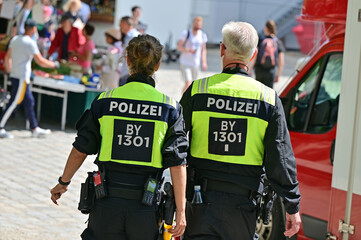 Police officers from behind at CSD parade in Munich, Bavaria