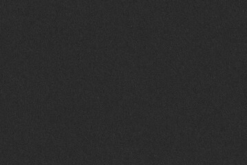 Texture of luxurious black fabric for cutting and sewing clothes. Background made of dense material. Textile