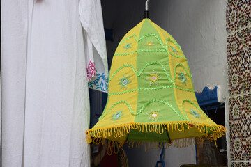 traditional lanterns hanging on the roof, green and Yellow Embroidered Cloth Lantern Lamp