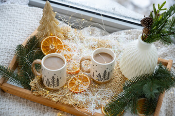 Cold morning with coffee. Christmas morning with coffee. Christmas mood.