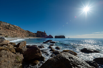 Wide angle view from the ground of a pretty Andalusian beach on a sunny autumn morning