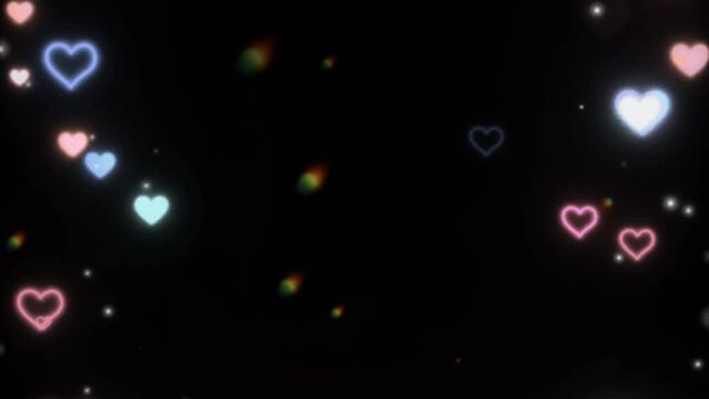 Heart light overly effects screen black background screen overlay effect shiny twinkle harts shine like stars dropping down colourful lights overly video effect Black background 