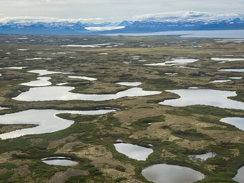 Aerial view of small ponds and shore line of Six Mile Lake, between Lake Clark and Lake Iliamna in Alaska. Near Nondalton, Mud River, Newhalen River, Pickerel Lakes.