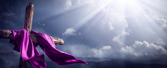 Flowing Purple Robe On Wooden Cross With Light From Heaven Shining Through The Clouds - The...