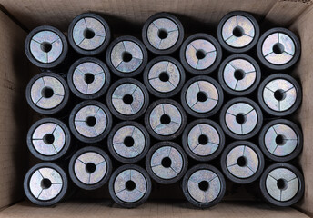 Background of many cylindrical metal repeating products processed on the machine