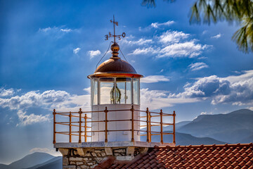 Head of the historic lighthouse of Paralio Astros, in Peloponnese Greece - obrazy, fototapety, plakaty