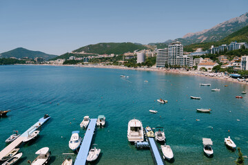 Motor boats are moored near the piers of the new part of Budva. Montenegro