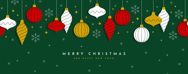 Christmas wide banner or greeting card with decorative ornaments and snowflakes on dark green background.