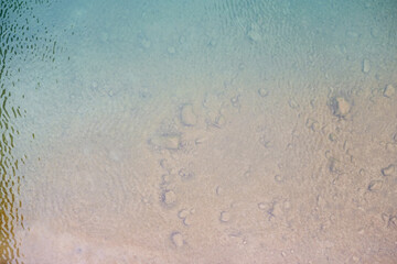 Clean transparent water of a river, top view