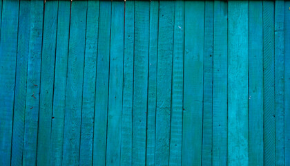 Close-up, vertical blue wooden planks. Detailed texture