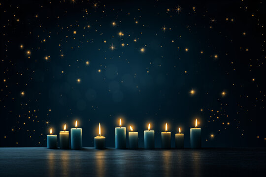 Flaming blue candles at night on dark background with stars and lights. Candles in Christian church as catholic symbol. Abstract festive backdrop. Christmas eve or Chanukah banner with copy space