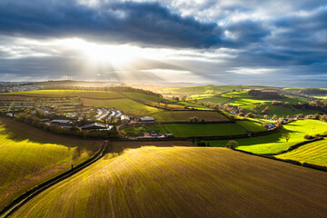 Lights and Shadows over Fields and Farms from a drone, Devon, England, Europe