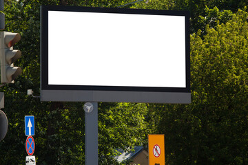 Large horizontal billboard next to a traffic light. Mock-up.