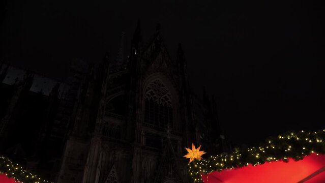 Fly forward through the Christmas Fair. In the background is the Cathedral in the center of Cologne.