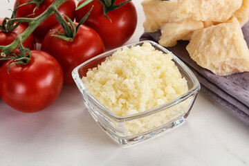 Shredded Italian hard parmesan cheese